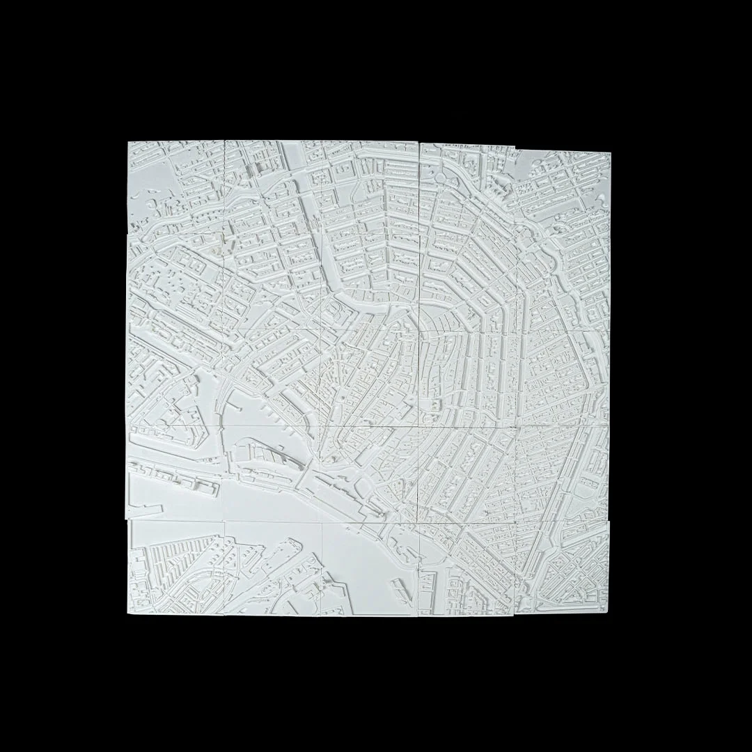 Full view of an Amsterdam city relief map showing the street and canal layout.