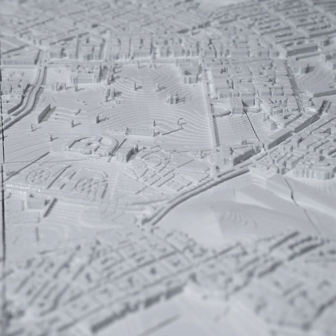 Low angled detail of an Athens city relief map showing building and terrain heights.