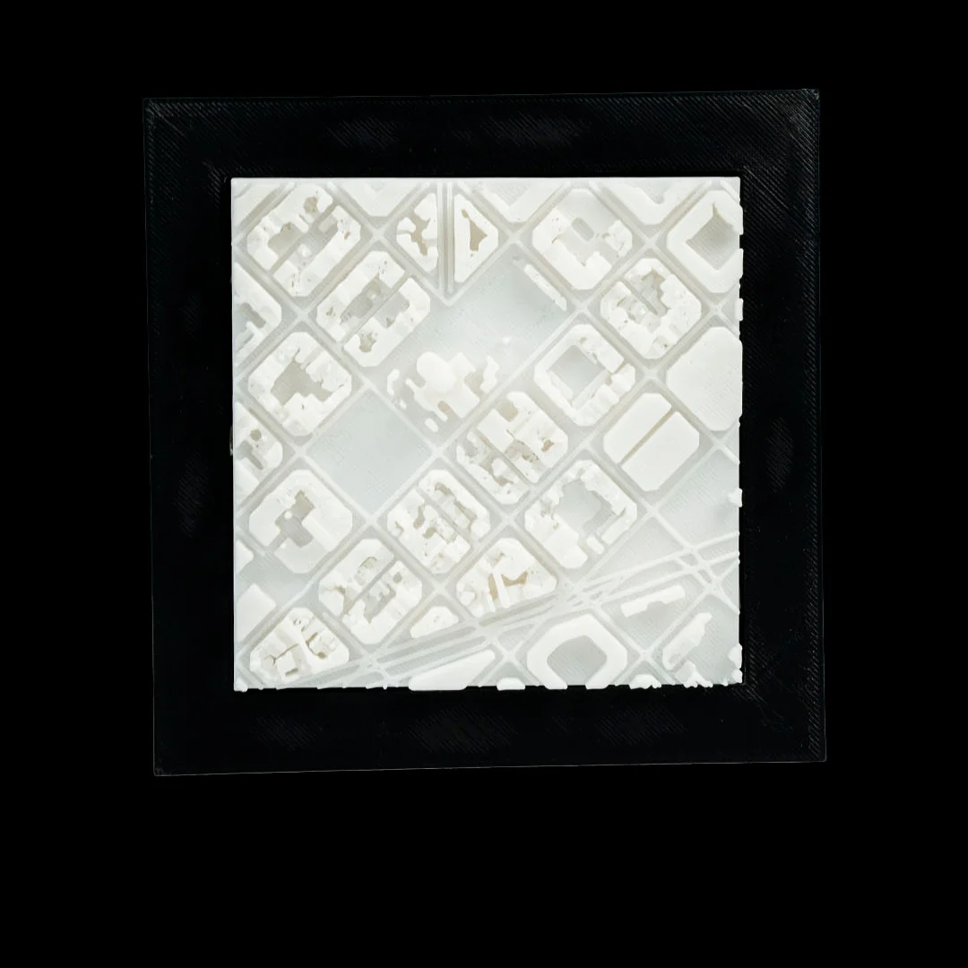 Front view of a framed Barcelona city relief map.