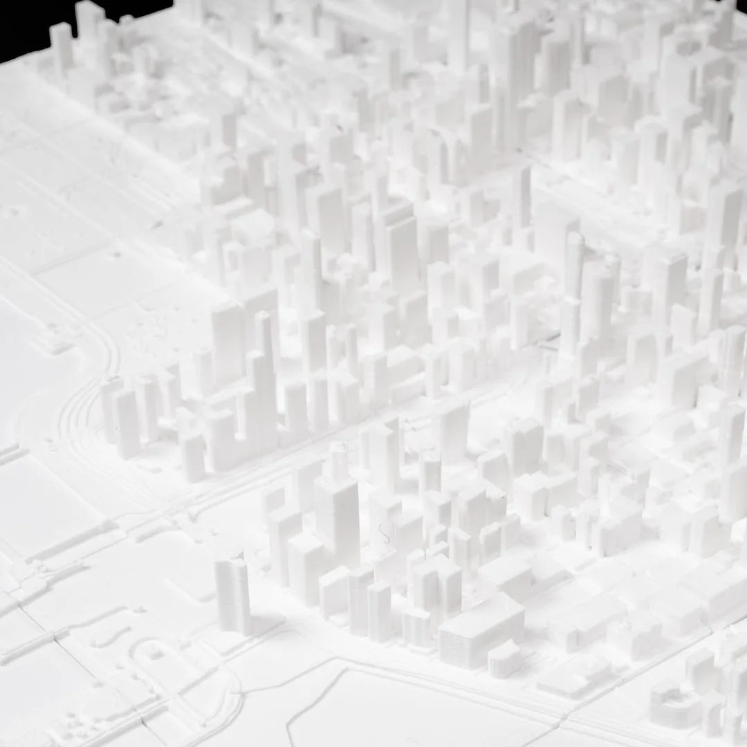 Elevated detail of a Chicago city relief map showing dense building blocks.