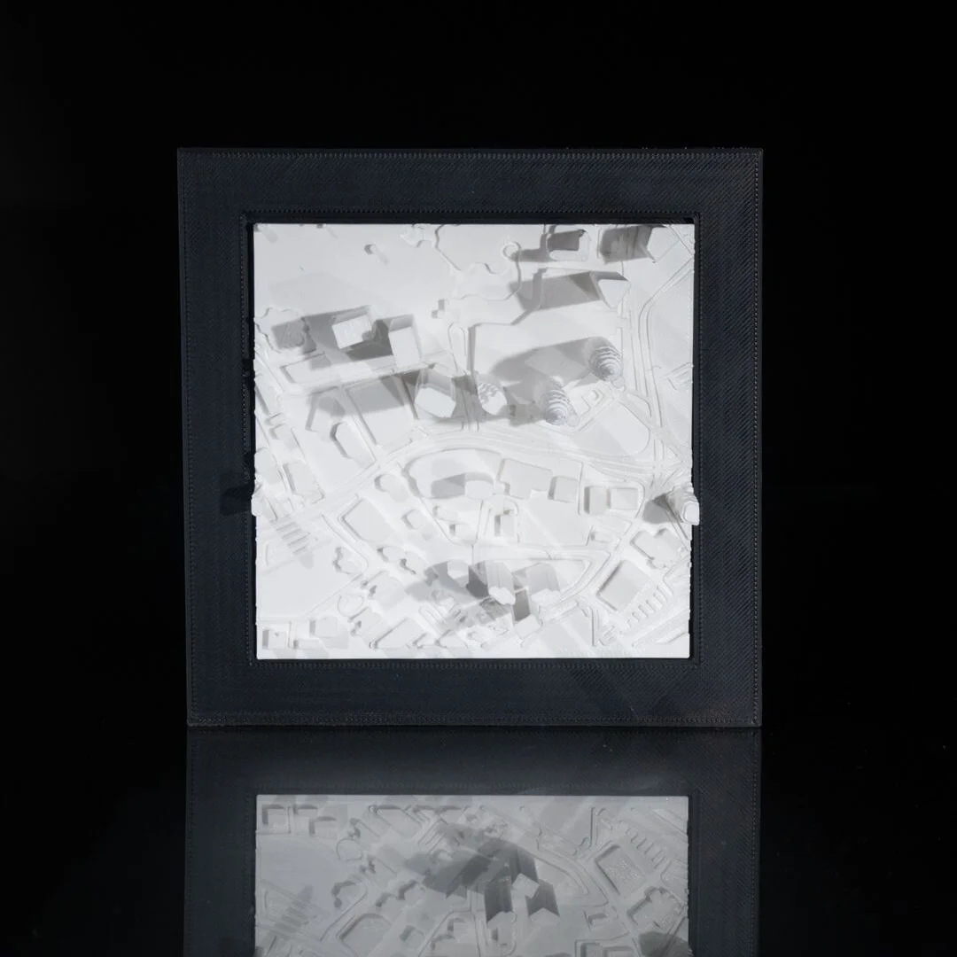 Framed Kuala Lumpur city relief map showing raised building forms.