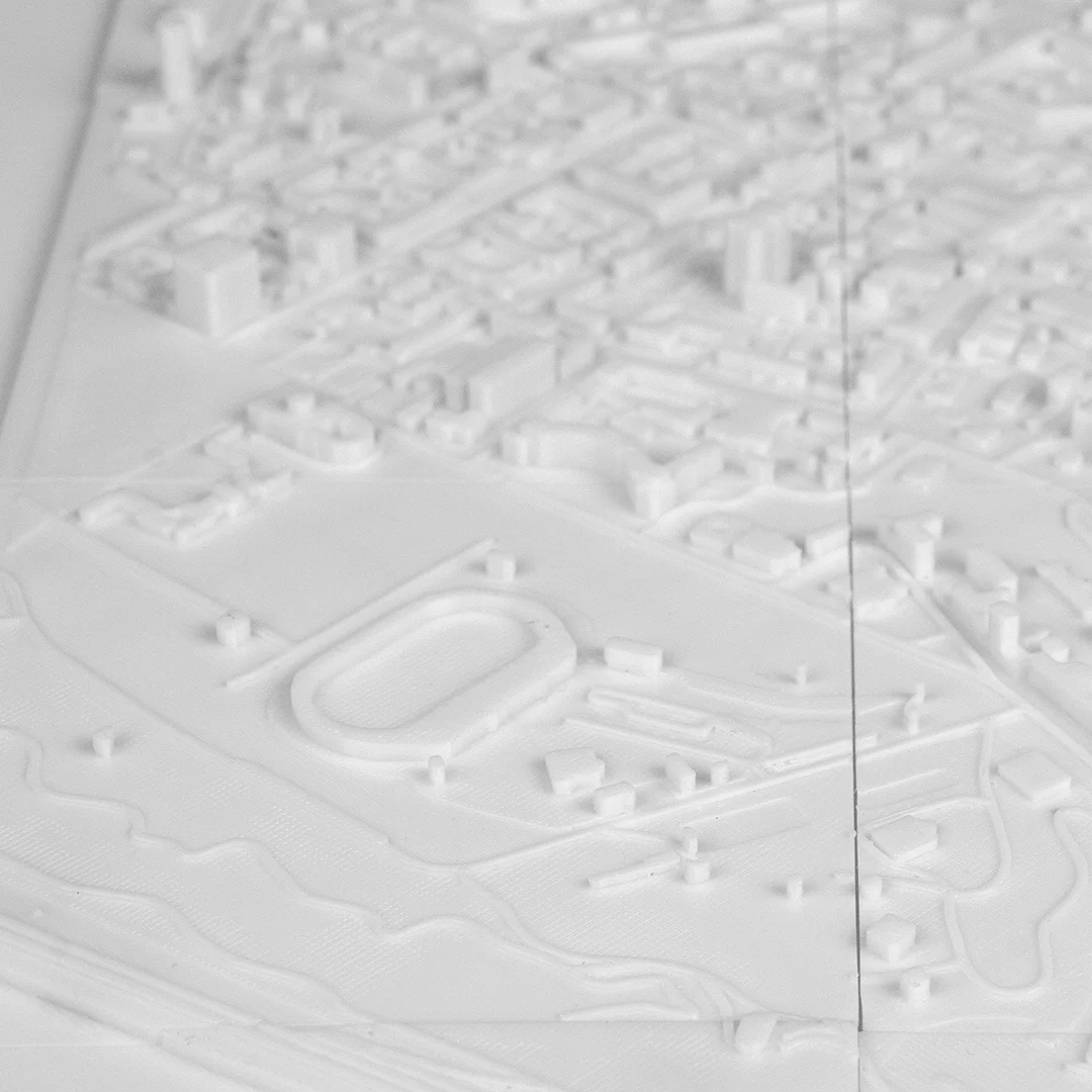 Close angled view of a stadium and surrounding roads in a Kyiv relief map.