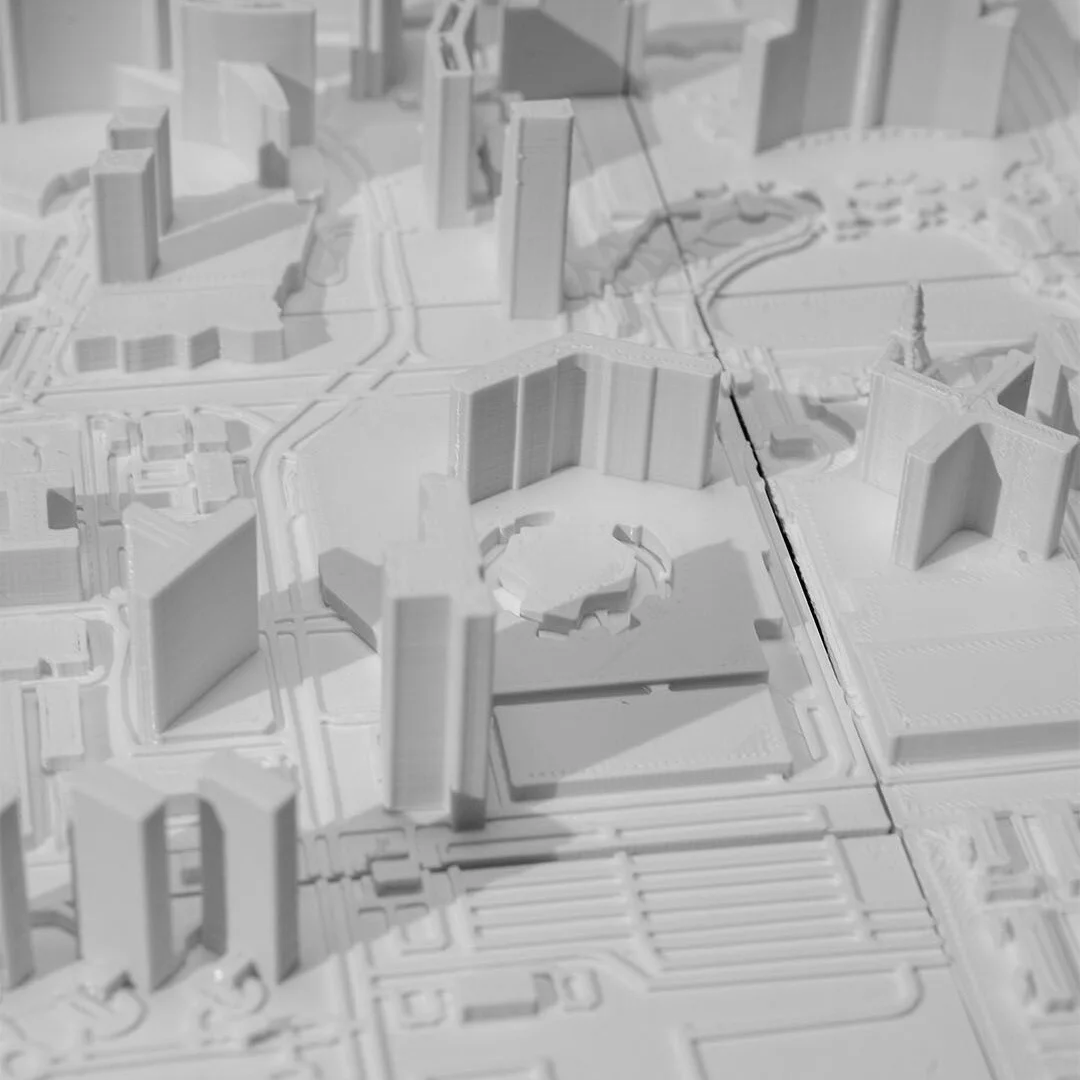 Angled view of building clusters and road layouts in a Las Vegas relief map.