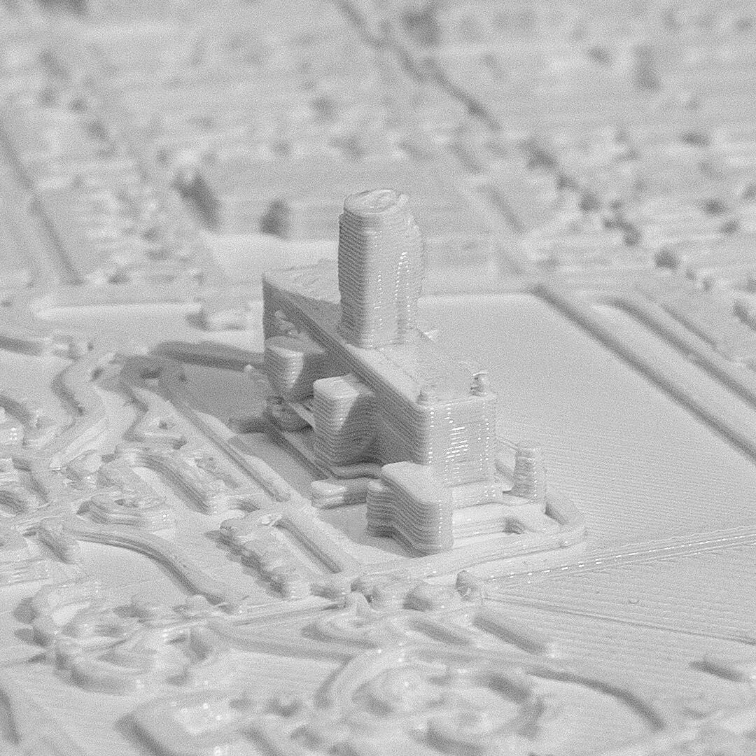 Close view of raised landmark buildings in a Liverpool city relief map.