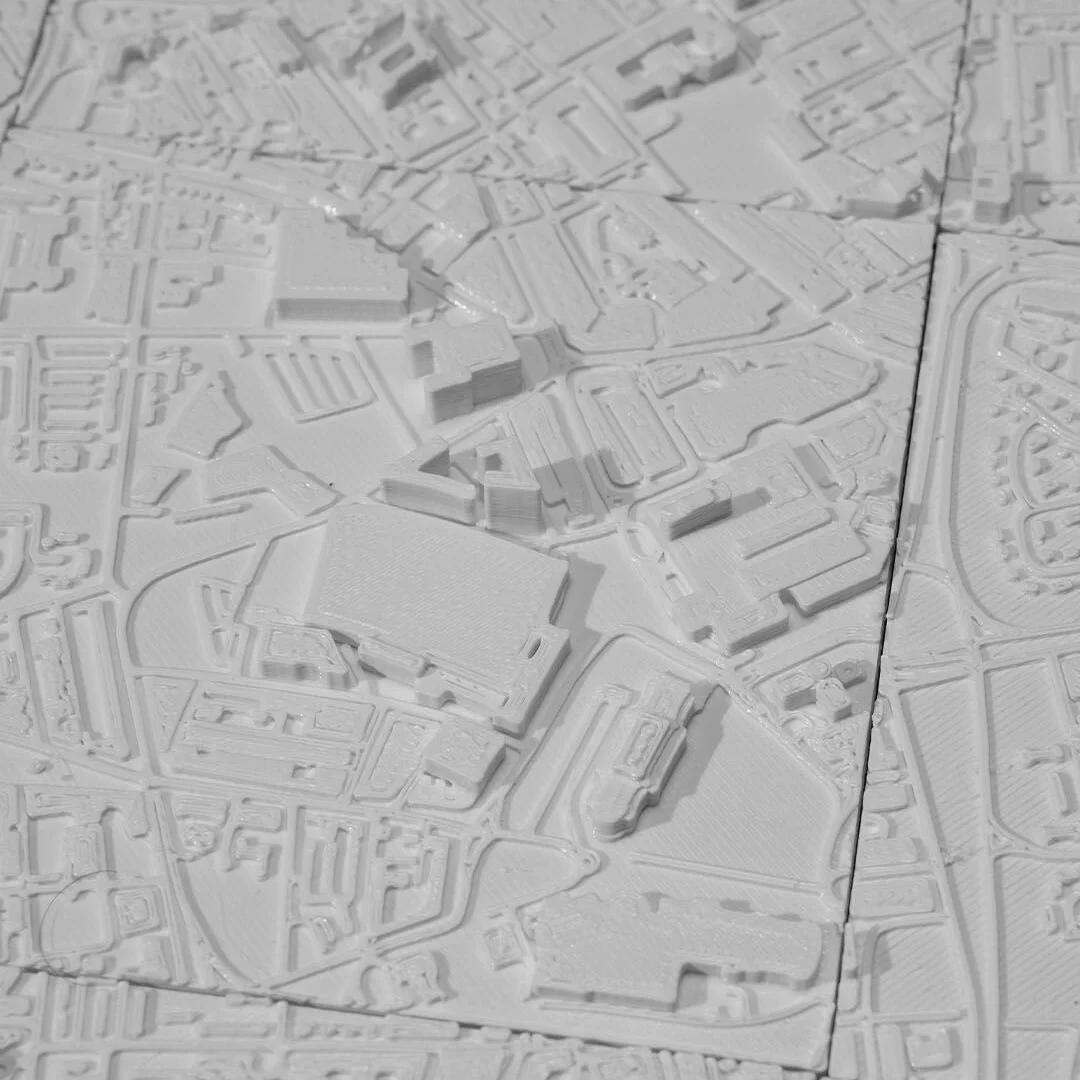 Overhead detail of a Liverpool city relief map showing buildings and transport routes.