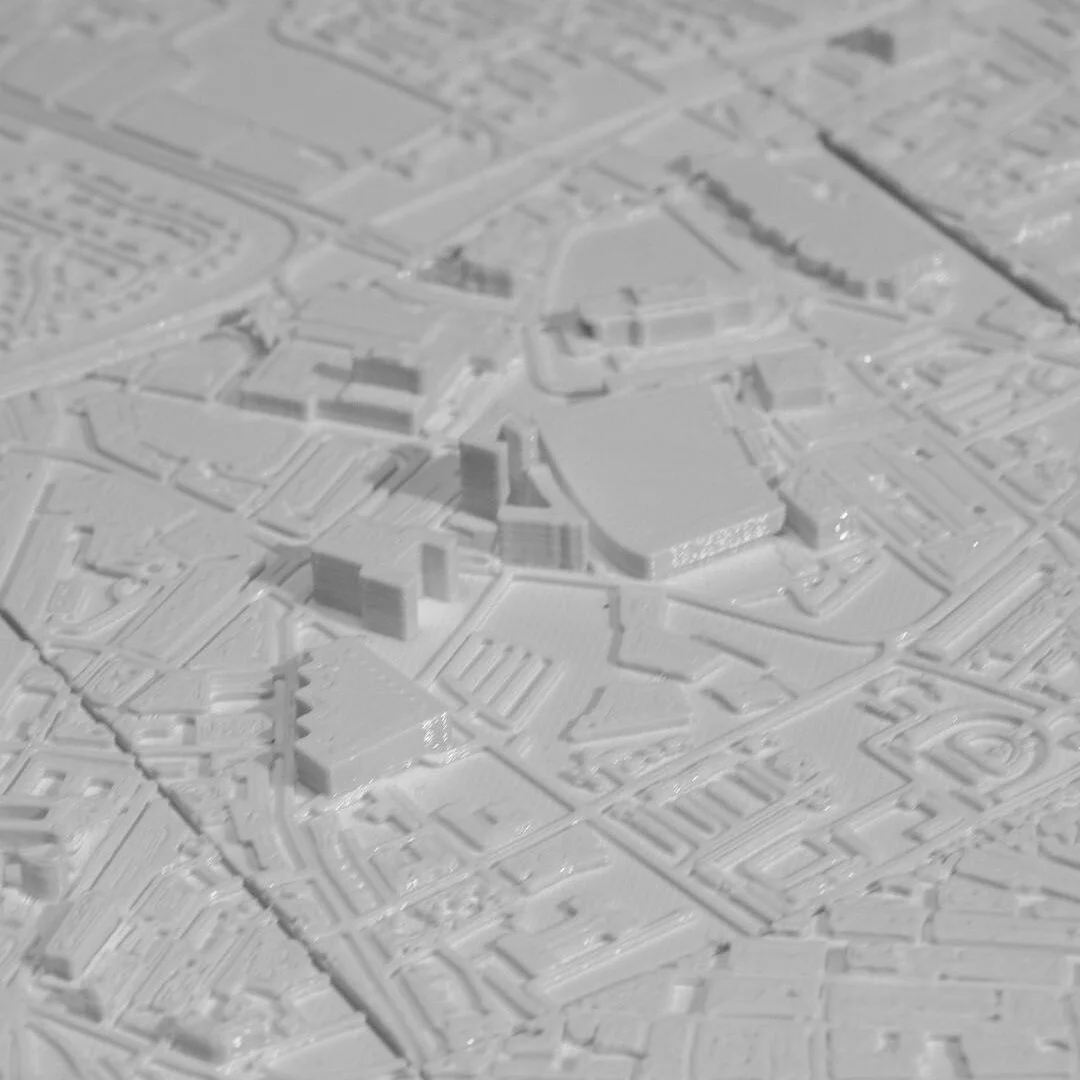 Close angled view of building forms in a Liverpool city relief map.