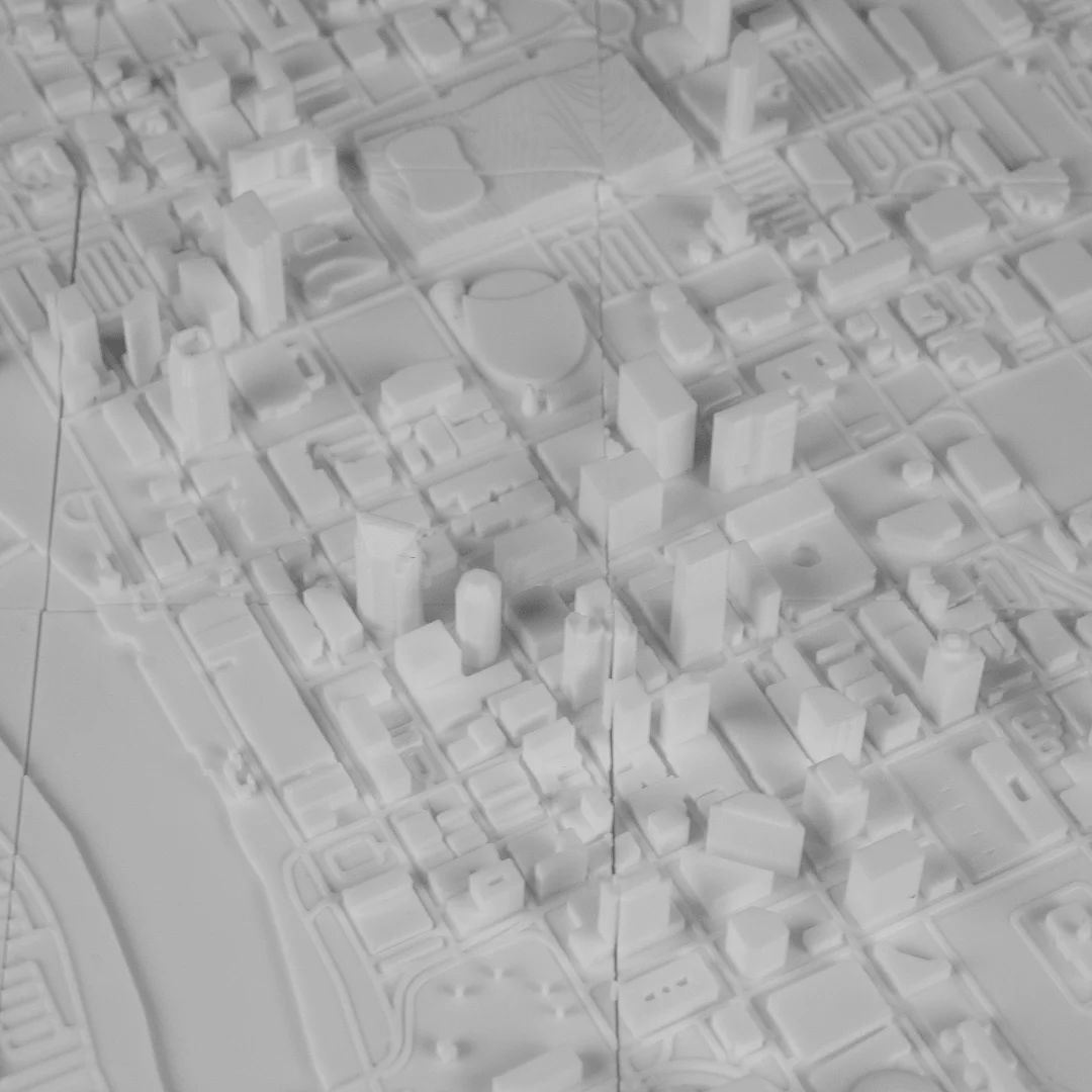 Angled overhead view of raised urban blocks in a Moscow city relief map.