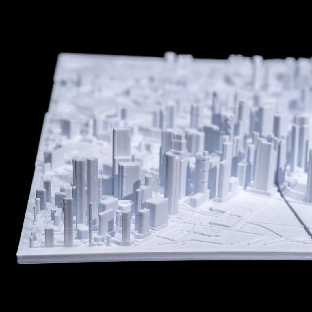 Angled view of raised towers in a Singapore city relief map.