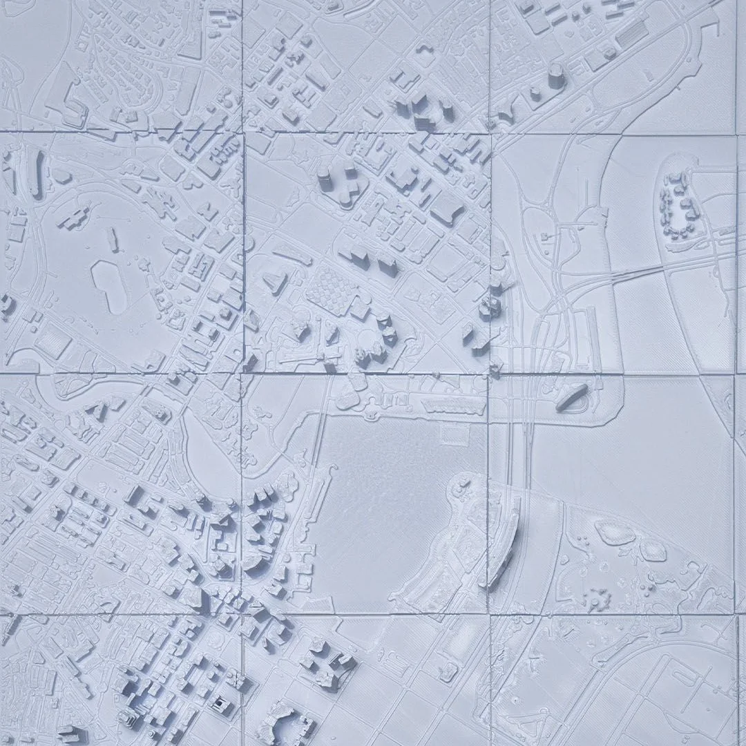 Overhead detail of buildings and roads in a Singapore city relief map.