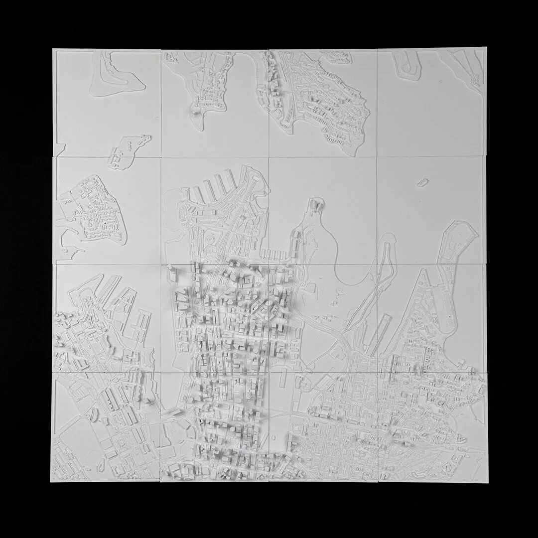 Full view of a Sydney city relief map assembled from square panels.