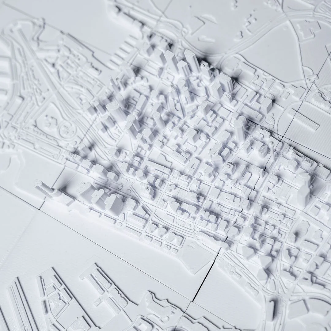 Angled overhead view of a Sydney city relief map.