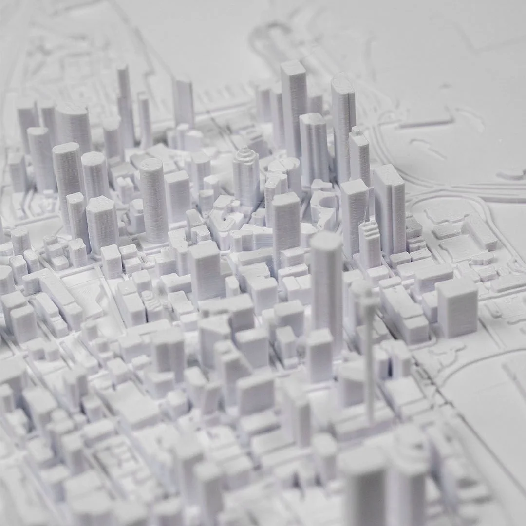 Wide detail of raised buildings in a Sydney city relief map.