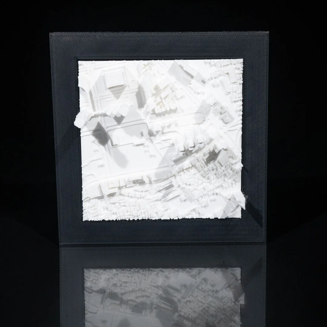 Framed Tokyo city relief map displayed upright.