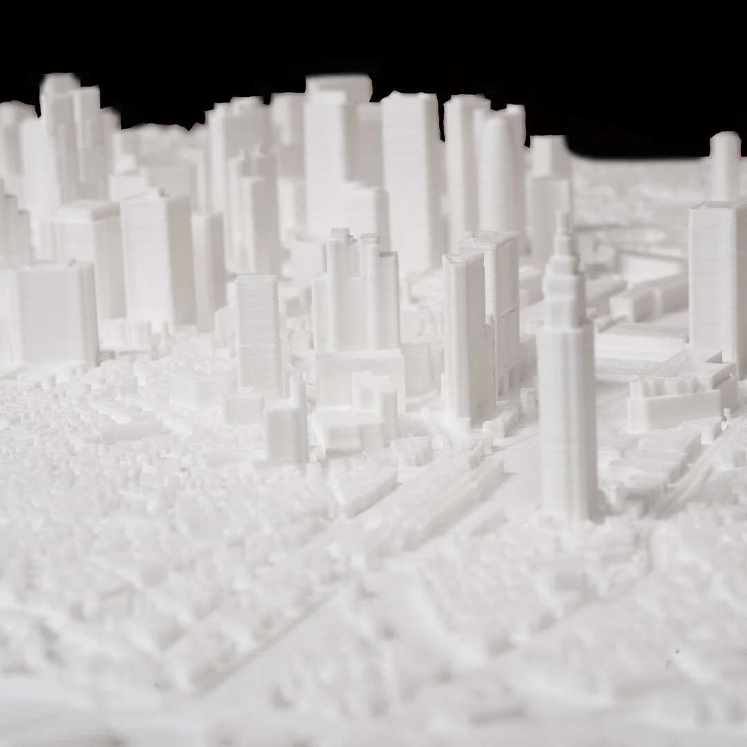 Low angled view of raised towers in a Tokyo city relief map.