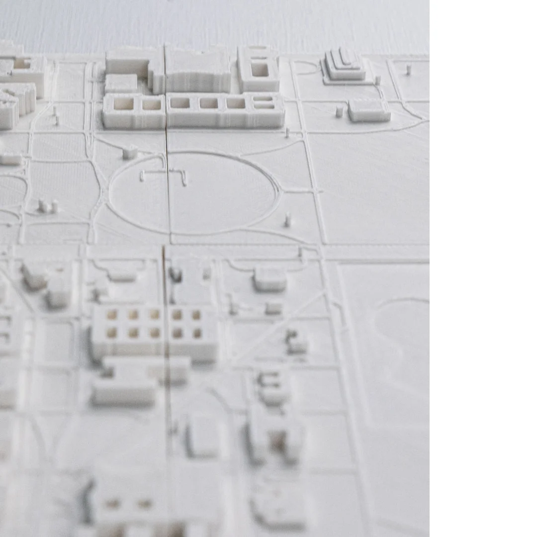 Close overhead view of buildings and pathways in a Washington DC relief map.
