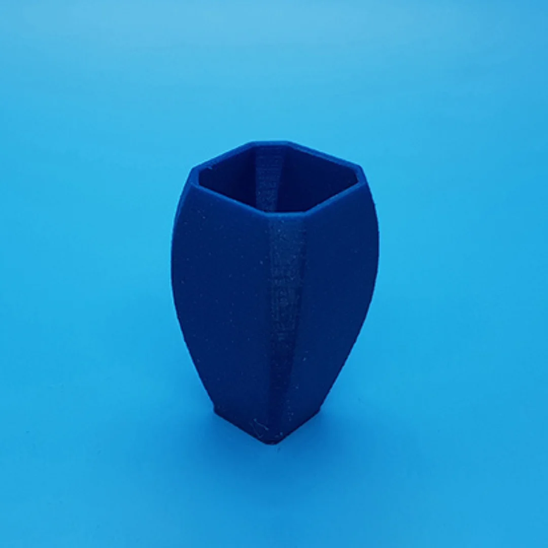Curvy Vase showing its open rim and 3D printed surface.