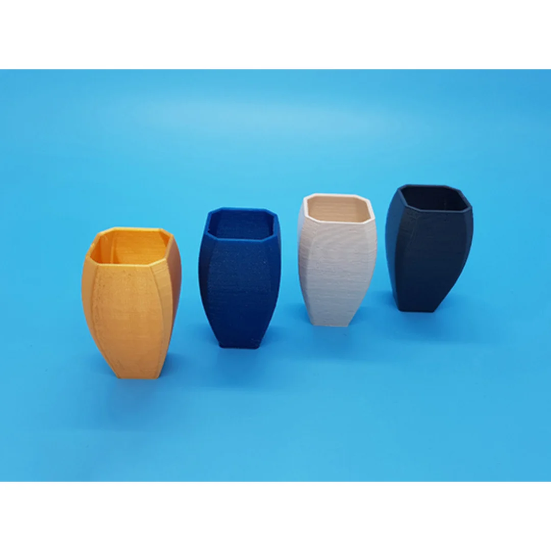 Curvy Vase models displayed together, showing their shape and open rims.