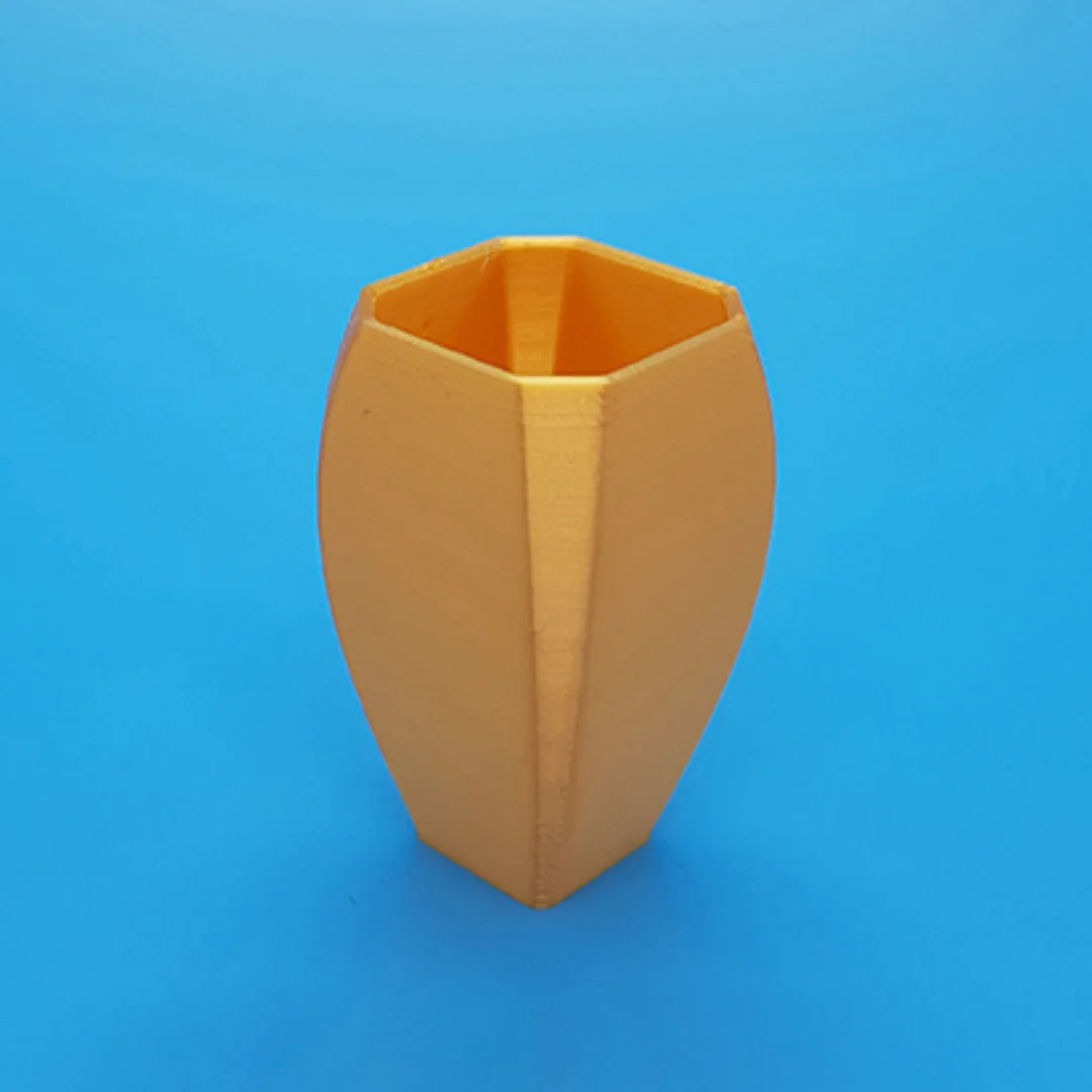 Curvy Vase showing its open rim and 3D printed surface.