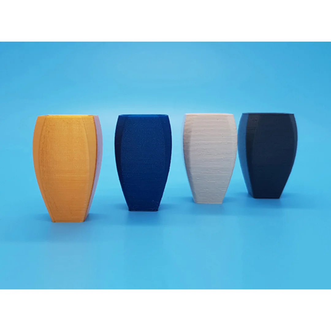 Curvy Vase models displayed together, showing their shape and open rims.