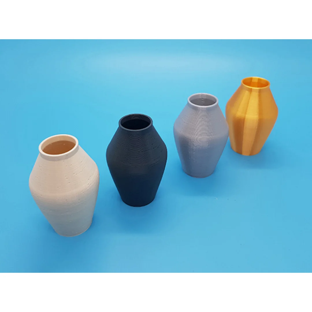 Frej Vase models displayed together, showing their shape and open rims.