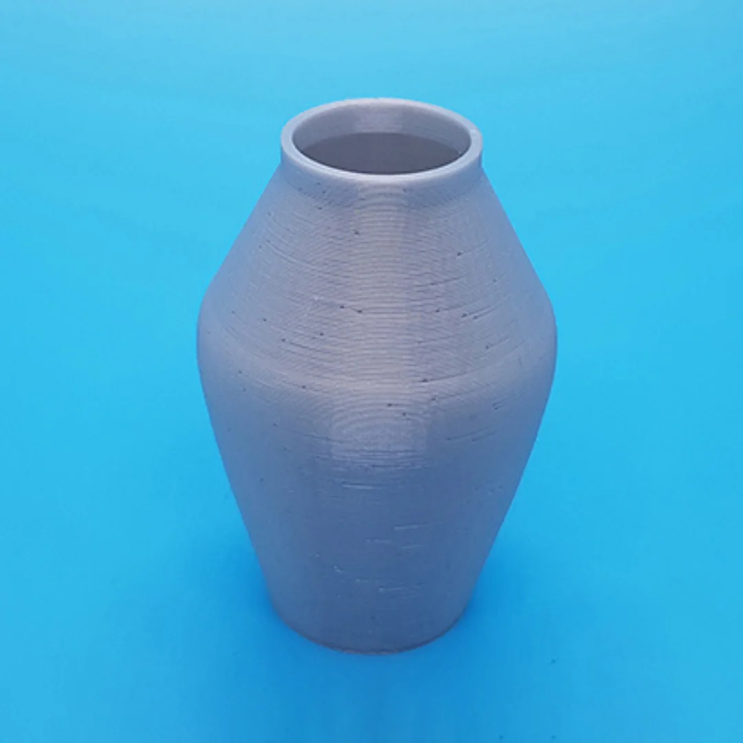 Frej Vase showing its open rim and 3D printed surface.