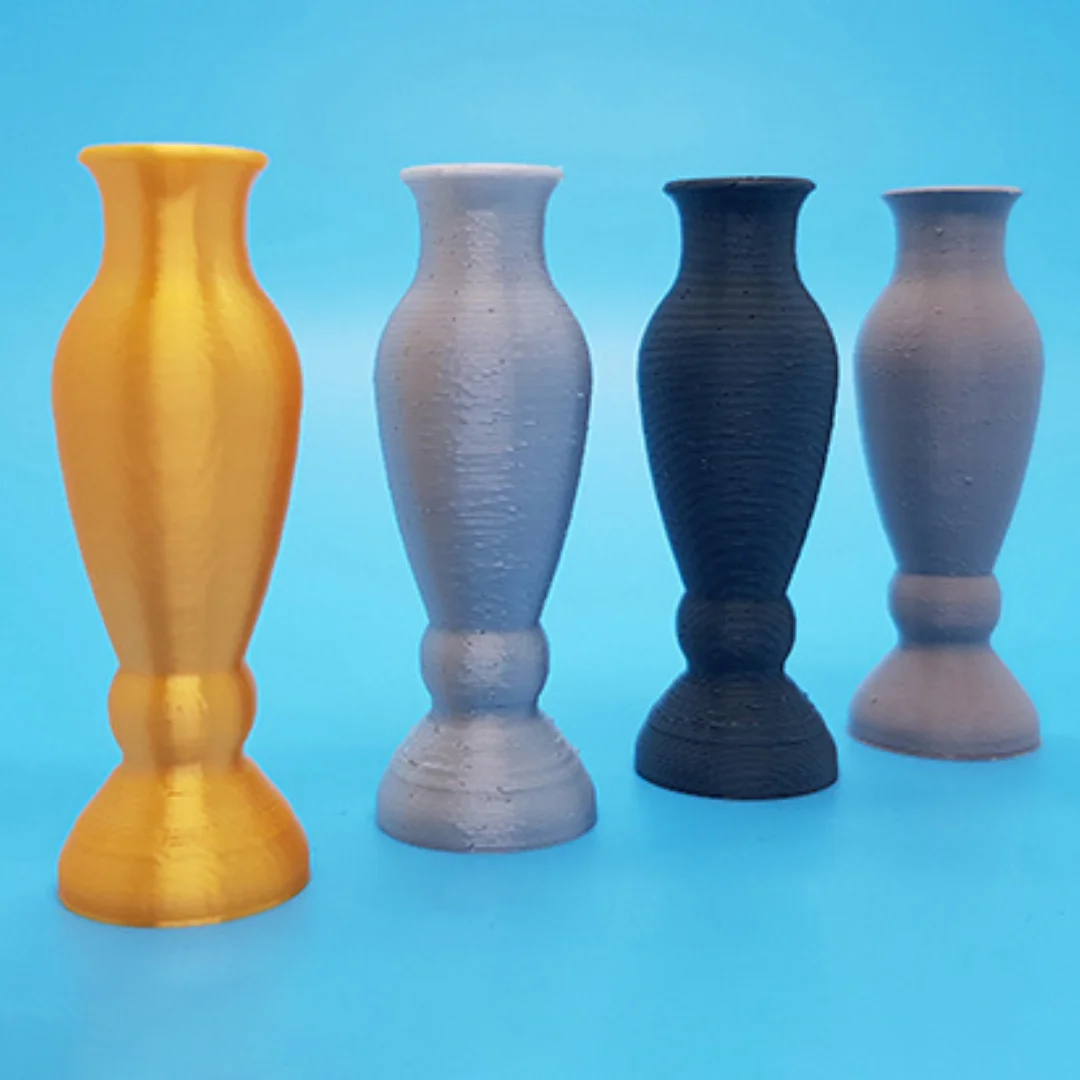 Queen Vase models displayed together, showing their shape and open rims.