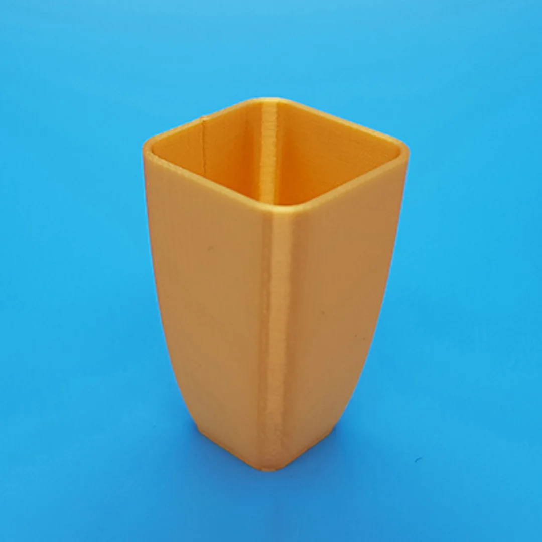 Rigid Vase showing its open rim and 3D printed surface.