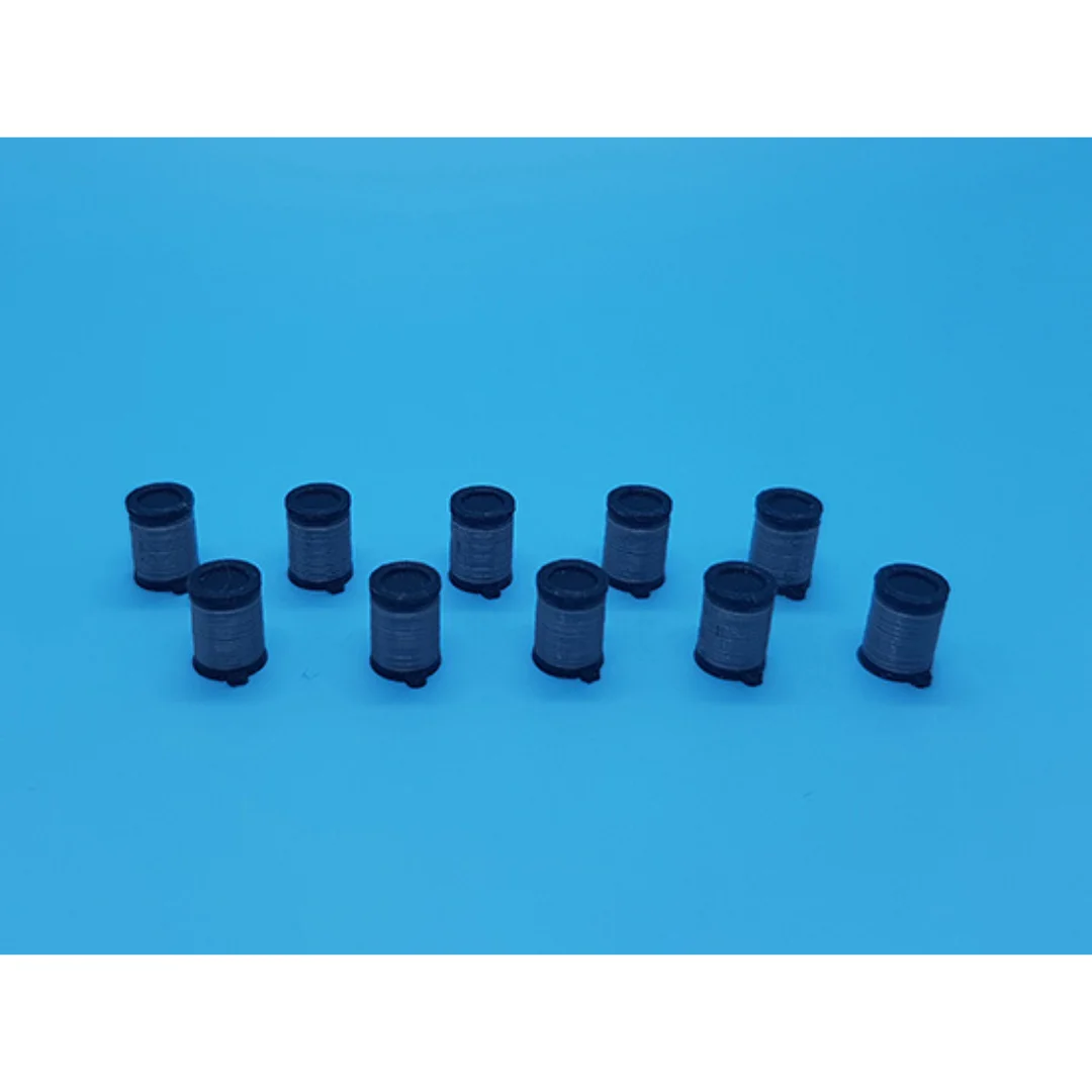Miniature pedal bins arranged to show their cylindrical bodies and lids at 1:50 scale.