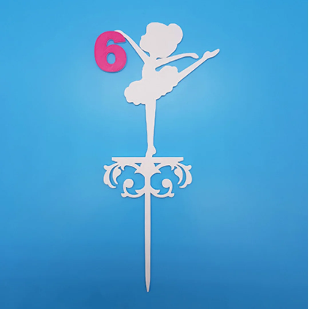 3D printed ballerina cake topper with the number 6, decorative scrollwork and a cake pick.