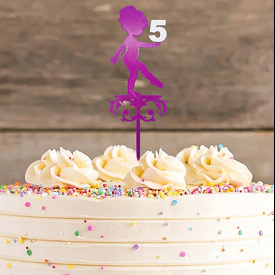Birthday cake topper with a child silhouette and the number 5 displayed on a cake.