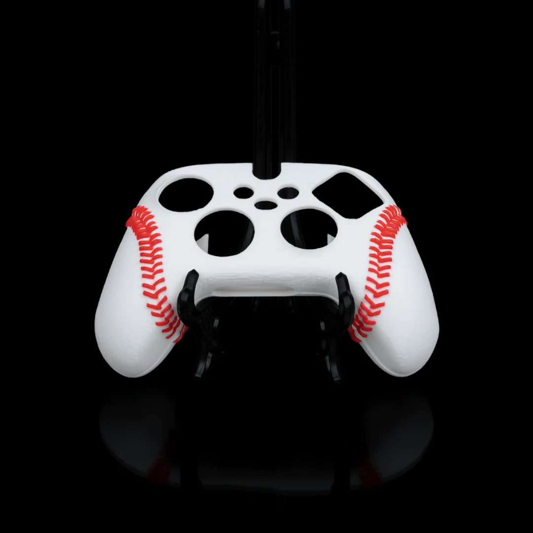 Baseball-style Xbox controller cover showing control openings and stitch detailing.