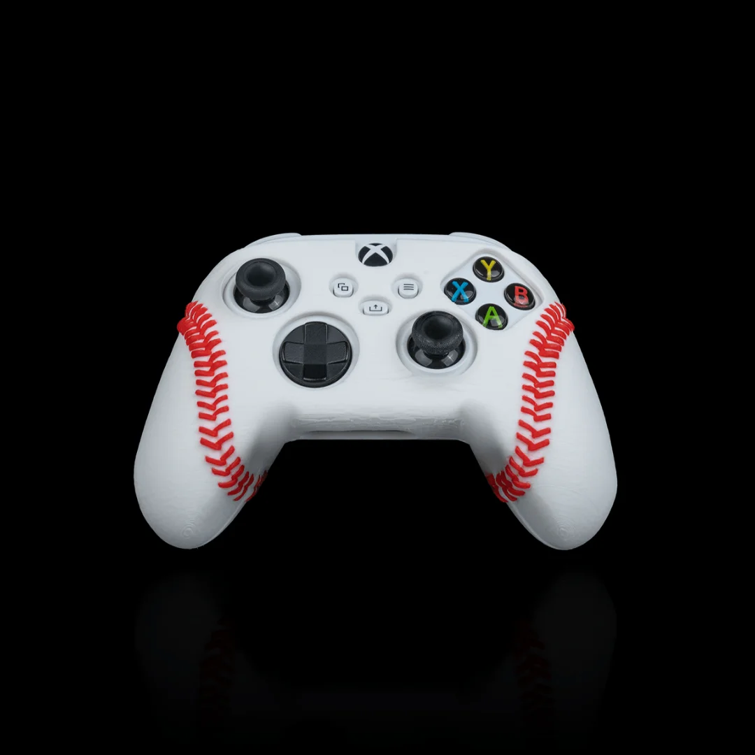 Front view of an Xbox controller fitted with a baseball-style cover.