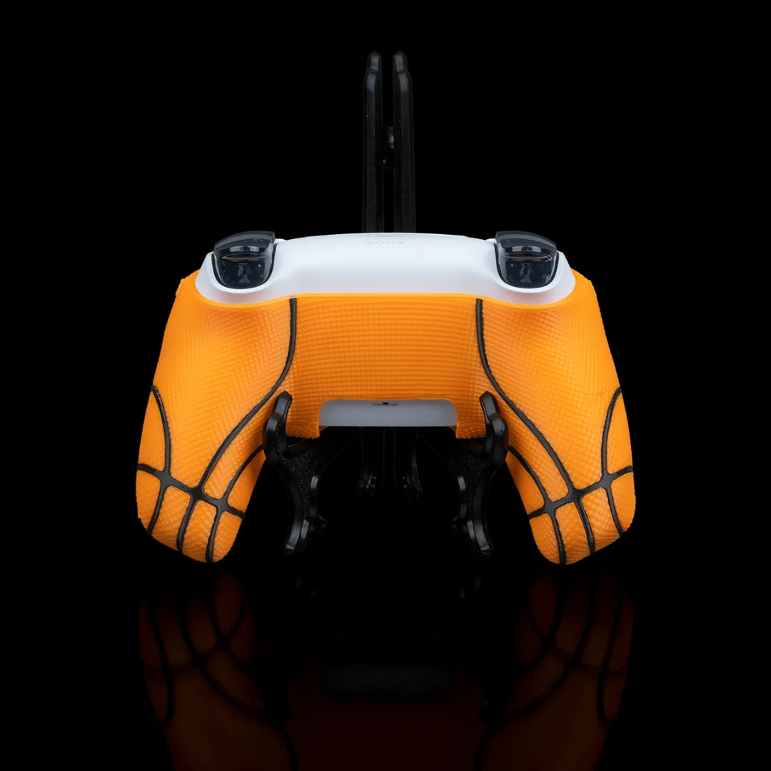 Rear view of a basketball-style PS5 controller cover.
