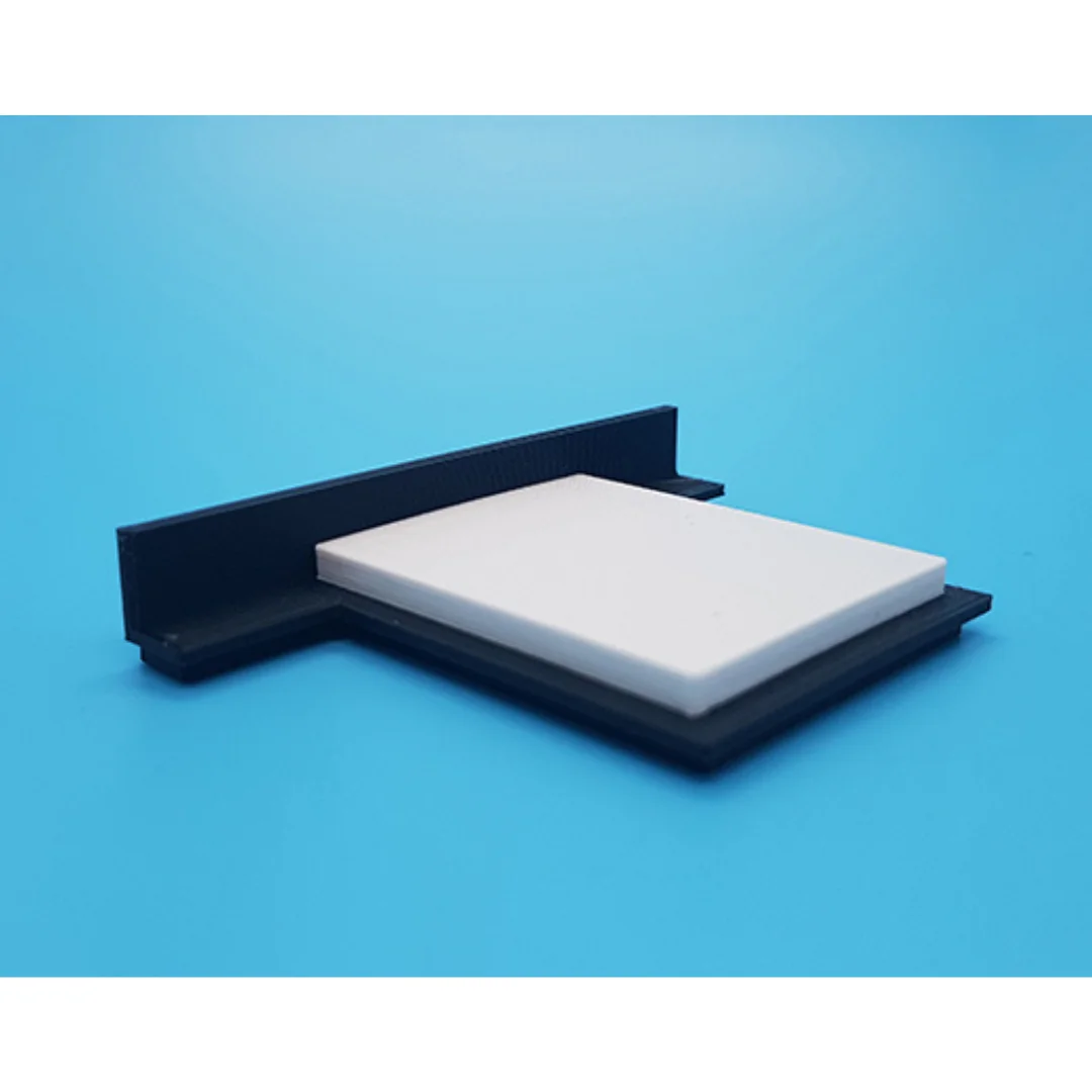 Chloe miniature bed at 1:50 scale, showing its headboard, mattress and base.