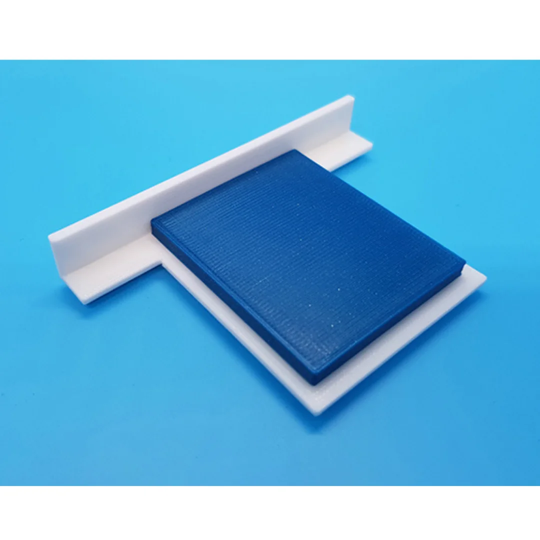 Chloe miniature bed at 1:50 scale, showing its headboard, mattress and base.