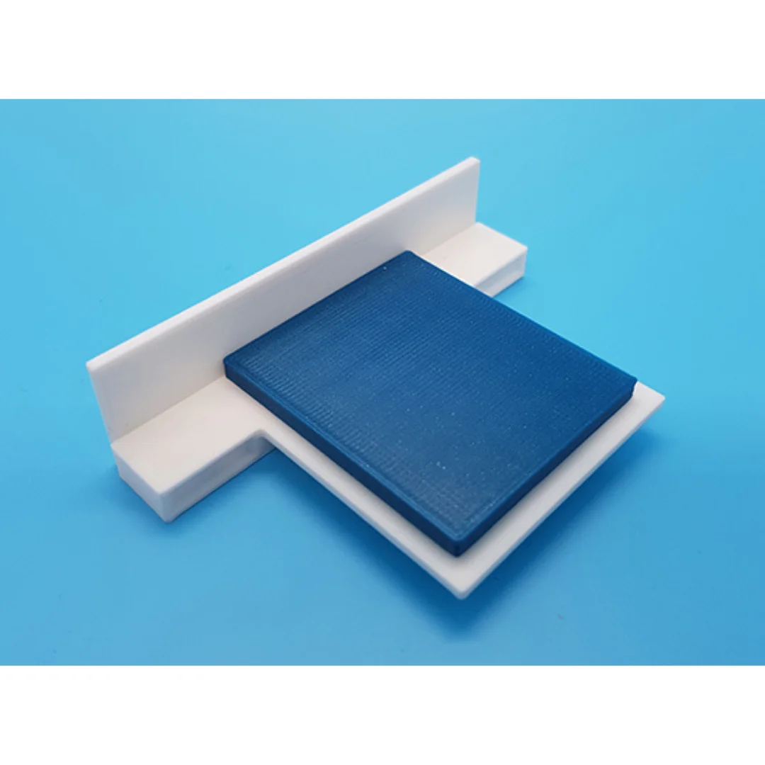 Cora miniature bed at 1:50 scale, showing its headboard, mattress and base.