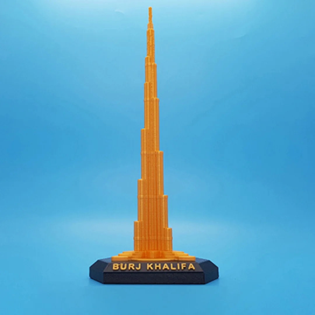 Front view of a Burj Khalifa model with the landmark name on its base.