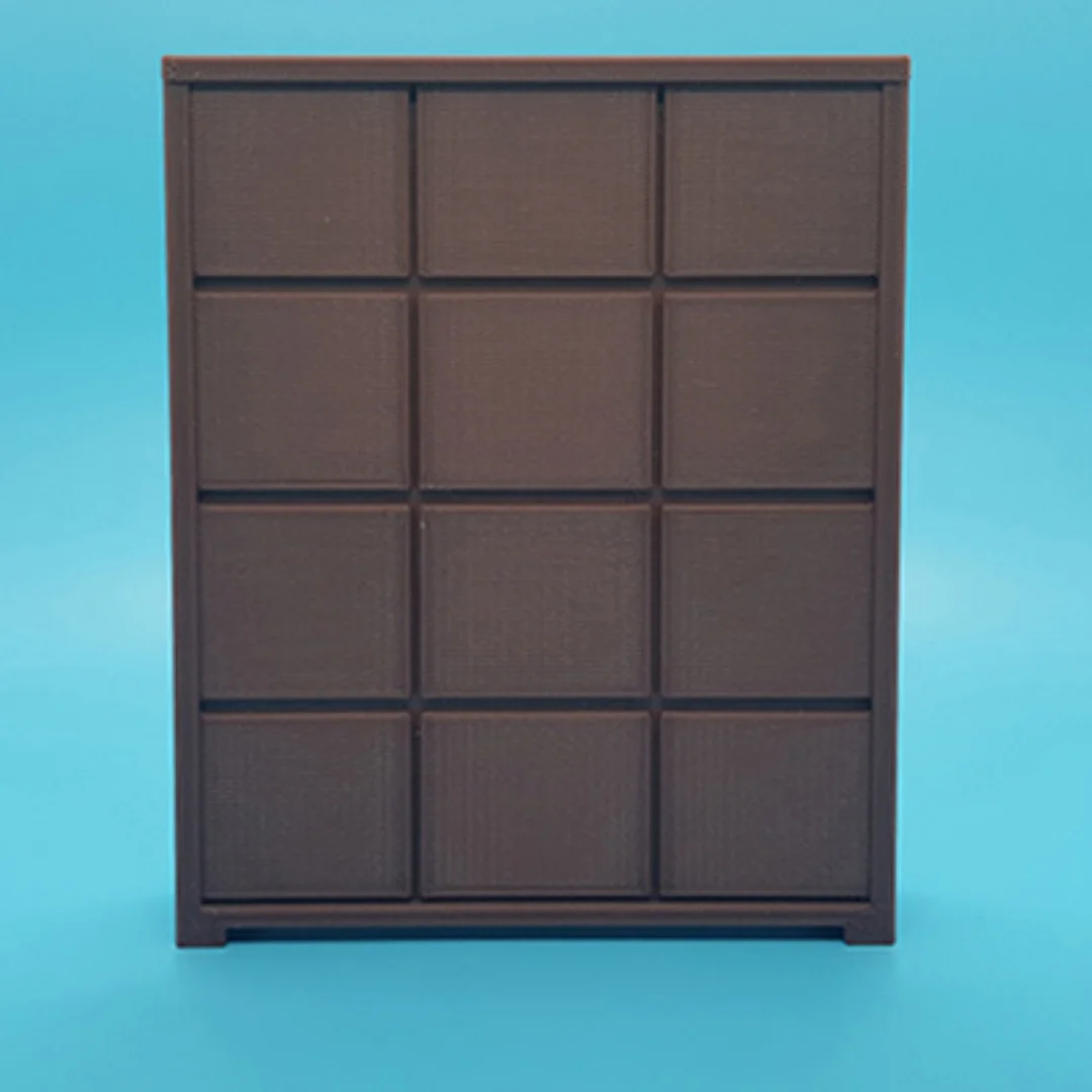Front view of the Elegant-1 miniature cabinet at 1:20 scale, showing its panelled front and frame.