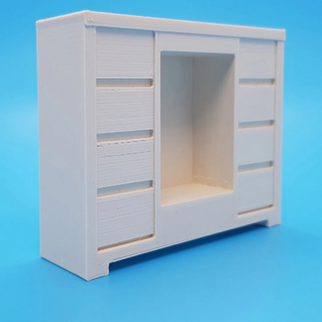 Angled view of the Elegant-4 miniature cabinet at 1:20 scale, showing the central open compartment and side panels.