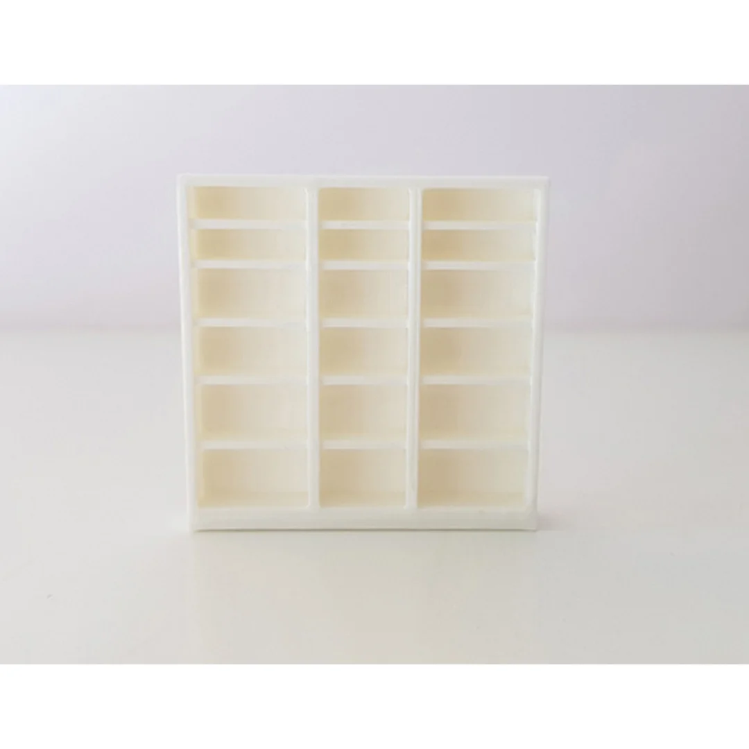 Large Bookshelf miniature model showing its shelving and cabinet design at 1:50 scale.