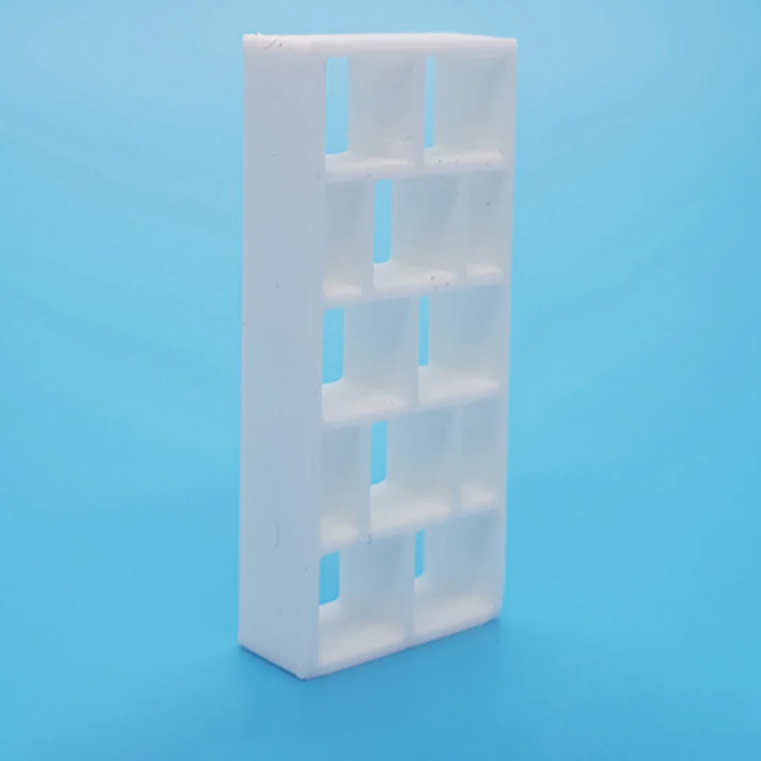 Complex Shelves miniature model showing its shelving and cabinet design at 1:50 scale.