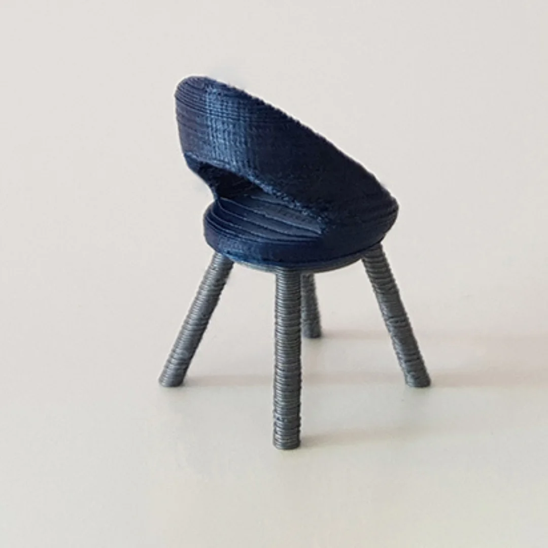 Mid-Century Chair miniature model viewed from the side at 1:50 scale.