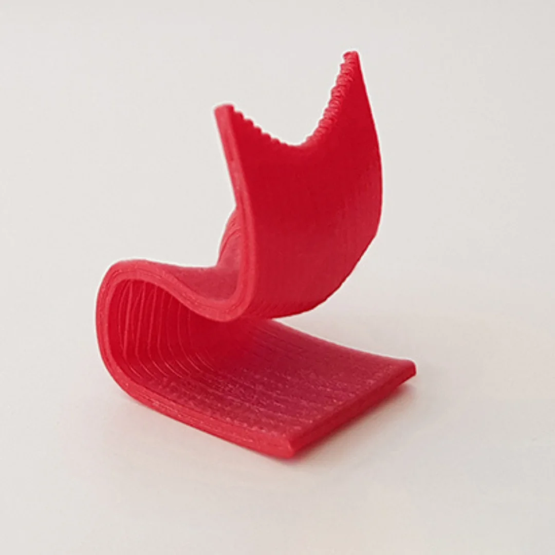 Cantilever Curved Back Chair miniature model viewed from the side at 1:50 scale.