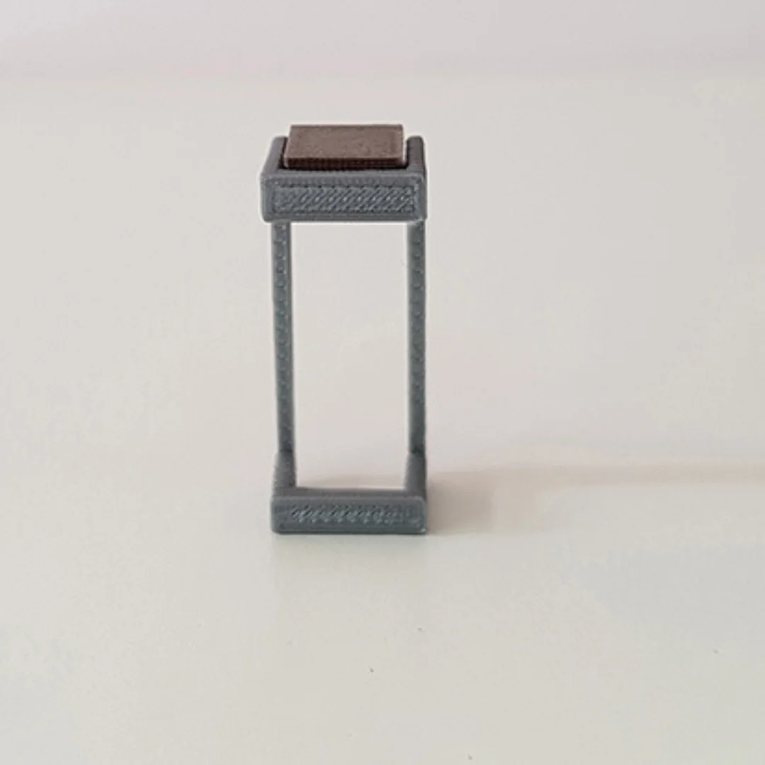 Cantilever Modern Stool miniature model at 1:50 scale.