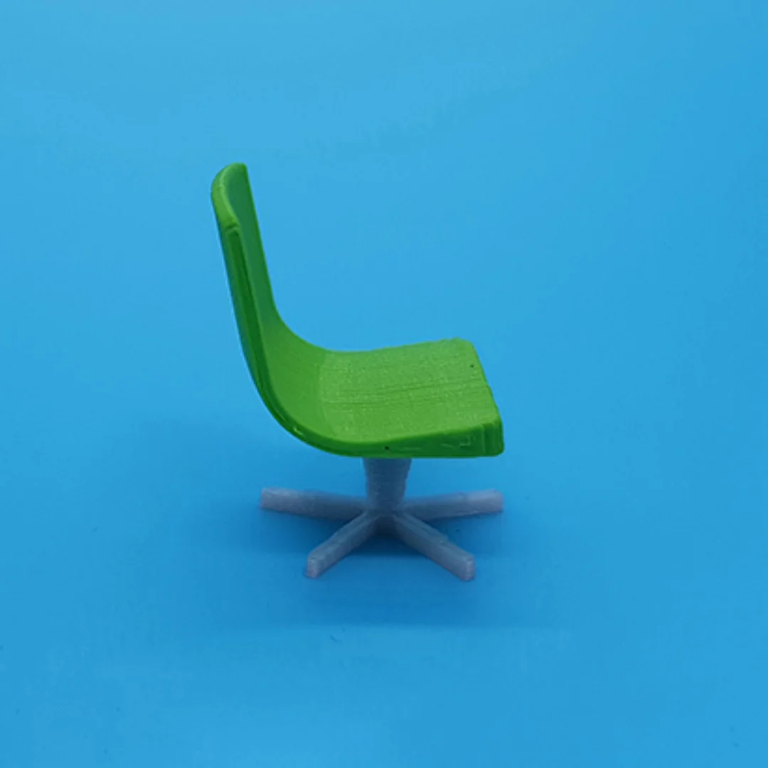 Designer Chair miniature model viewed from the side at 1:50 scale.