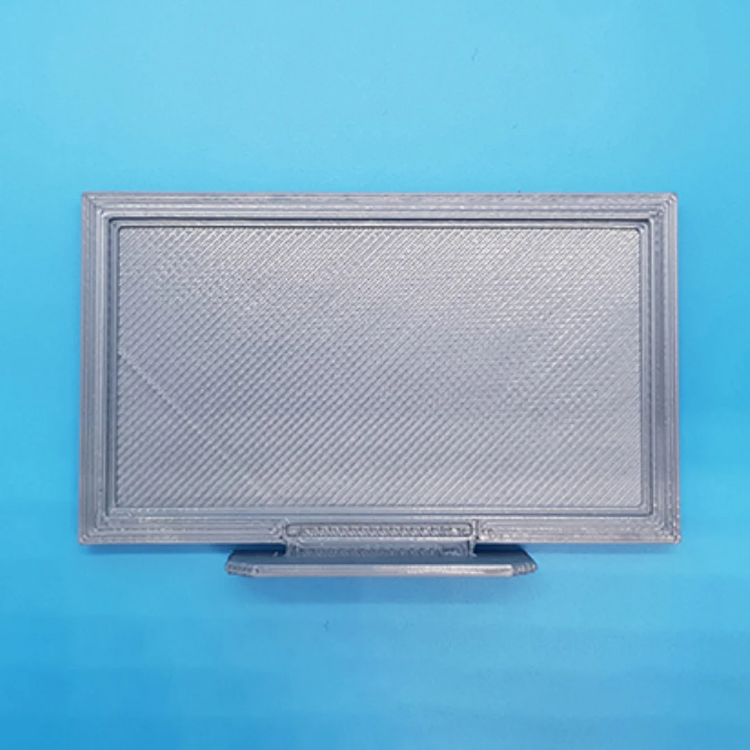 Flat TV-1 miniature model at 1:20 scale.