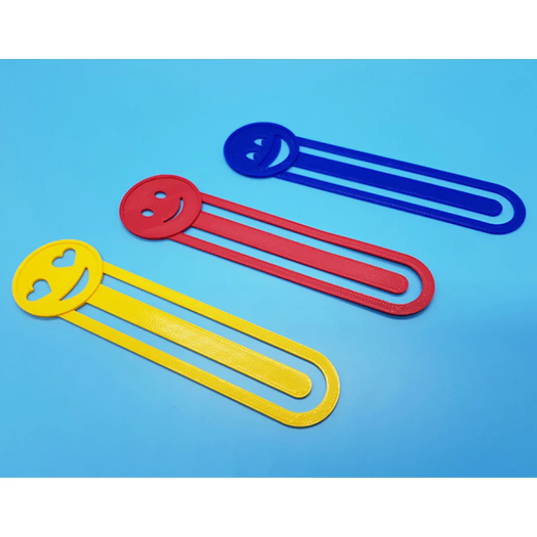 Three separate emoji bookmarks showing different facial expressions.