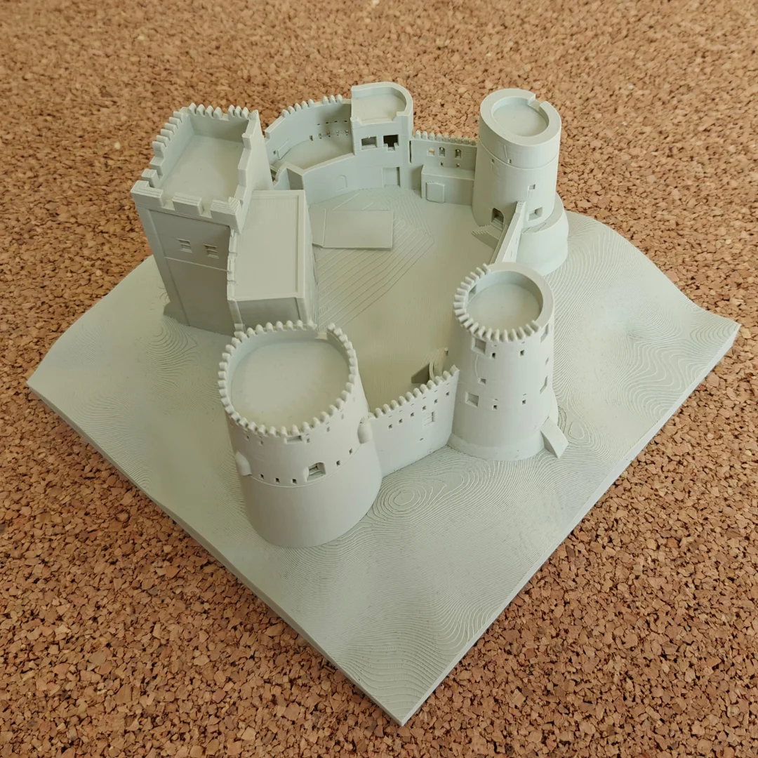 Opposite elevated view of a Fujairah Fort model showing its walls and tower layout.