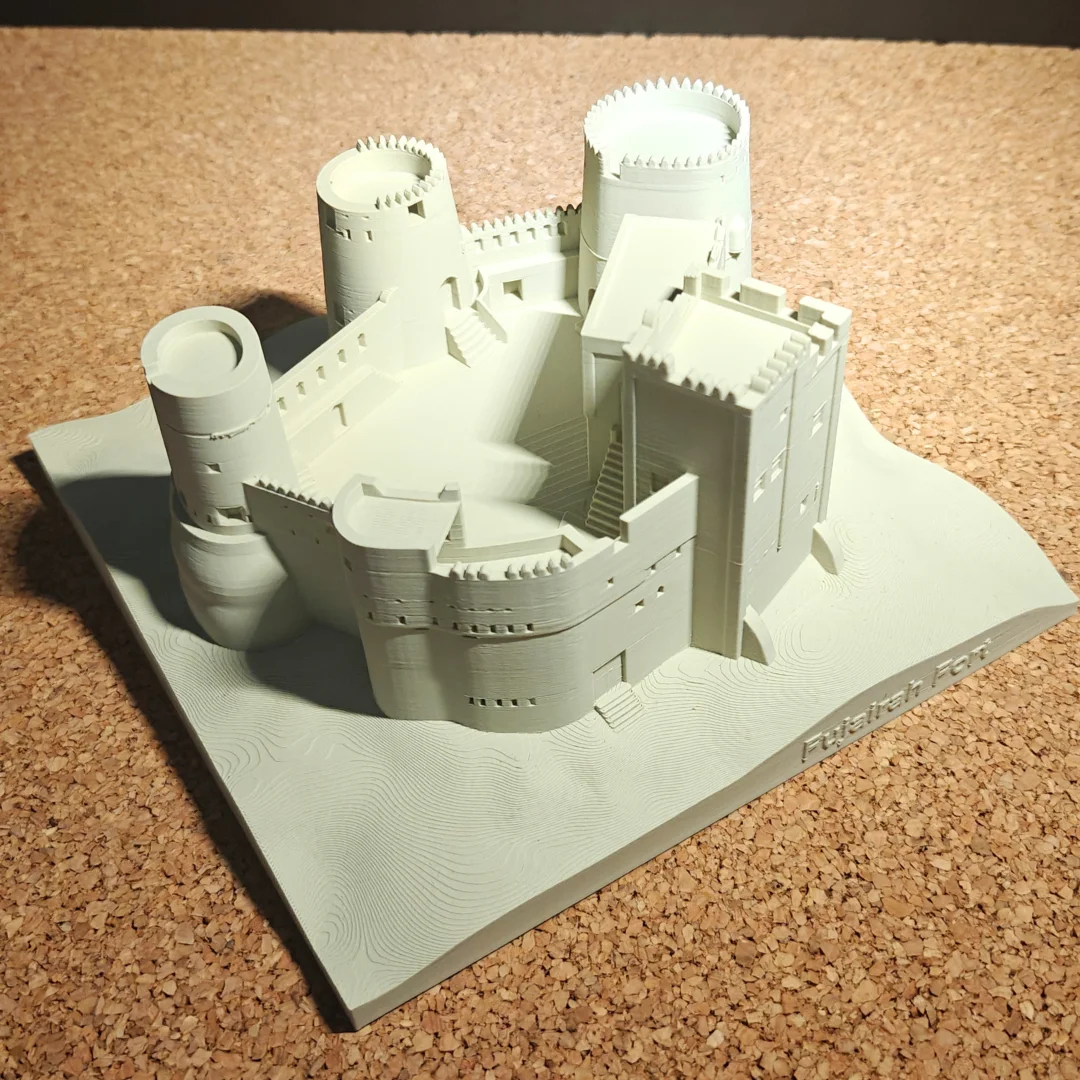 Overhead angled view of a Fujairah Fort model showing towers and interior spaces.