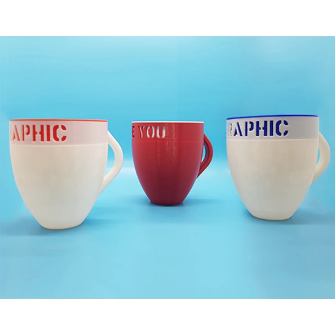 Group view of three personalised mug-shaped desk holders with handles.